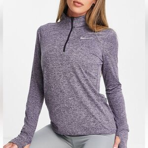 Nike Running Dri-FIT half-zip long sleeve top in purple